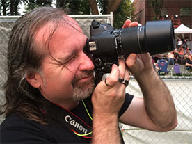 Steve Lovitt Photographer at a music festival 